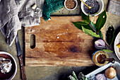 Used wooden cutting board and spices