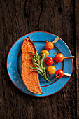 Sweet potato with rosemary and tomatoes on sticks