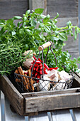 Fresh herbs, garlic, chillies and cinnamon sticks (for metabolism)
