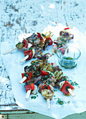 Grilled pork skewers with potatoes and peppers