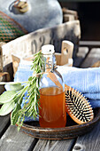 Homemade herbal vinegar rinse for the hair (against dandruff)