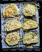 Cabbage steaks on an oven tray