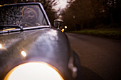 Young woman driving convertible