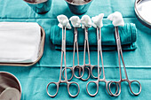 Surgical instruments and swabs on a table