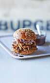 Pulled pork brioche bun with tangy cabbage slaw