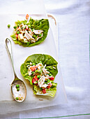 Tuna, sweetcorn and pea salad in baby Gem lettuce wraps