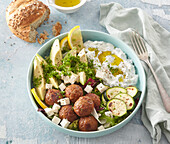 A bowl with avocado and meatballs (Greece)