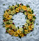 A Christmas wreath with citrus fruits