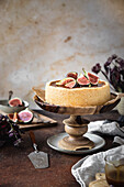 Caramel cheesecake with fig compote, fresh figs and caramel sauce