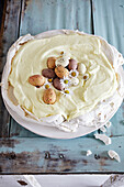Pavlova with lemon cream and Easter decoration