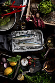 Still life with mackerel and fresh garden vegetables