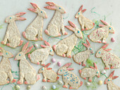 Several Easter bunnies made of shortcrust pastry with icing