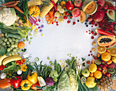 Fruit and vegetables grouped around the edge of the picture