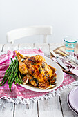 Spring roast chicken with sage, lemon garlic and asparagus
