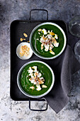 Spinach soup with feta and almonds
