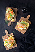 Bread with scrambled eggs and salmon