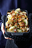 Cauliflower with mustard-cheese sauce and pretzel croutons