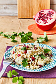 Couscous salad with feta and pomegranate seeds