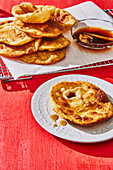 Bunuelos Mexicanos - fried dough pancakes with guava syrup from Mexico