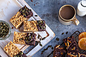 Dessert bars with chocolate icing and pumpkin seeds