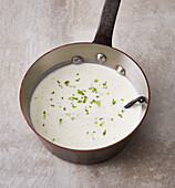 Sweet buttermilk soup with vanilla in a pot