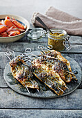 Grilled mackerel fillets on skewers