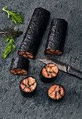 Mosaic salmon rolls in nori leaves