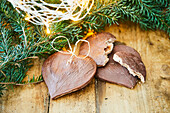 Heart-shaped Christmas cookies with chocolate icing