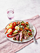Greek style lamb with roasted peppers and potatoes