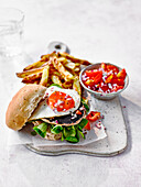 Mushroom burger with spicy tomato dressing and chips