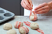 Bacon rolls being made