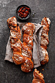 Tomato twists made from spelt dough