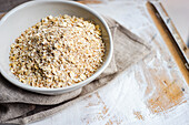 Raw organic oatmeal in the bowl