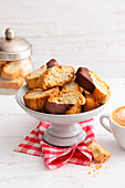 Vegan cantuccini with almonds and chocolate icing