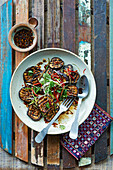 Malay-grilled aubergine with ketjap manis, lime and spring onion