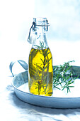Rosemary oil in flip-top bottle