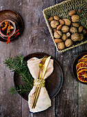 Christmas table setting on rustic wooden table