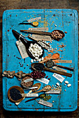 Various beans and lentils on blue?rustic wooden surface