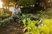 Woman working in her vegetable garden
