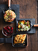 Raclette variations with cheese, meat and fish