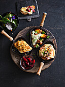 Raclette-Variationen mit Käse, Fleisch und Fisch