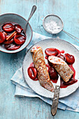 Pancakes with poppy seeds and roasted plums