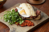 Bacon and egg ciabatta with watercress and Spicy Arrabbiata Sauce