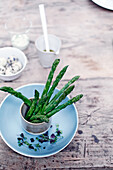 Green asparagus as table decoration for an Easter table