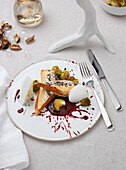 Sweet potato and porcini mushroom strudel with Brussels sprouts and a blackberry-beetroot sauce