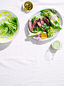 Chipotle beef salad with charred corn and green buttermilk dressing