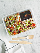 Spicy rice salad with cashews and Asian dressing