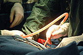 Surgeons performing an operation