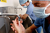 Surgeons scrubbing up