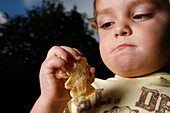 Young child with crisps